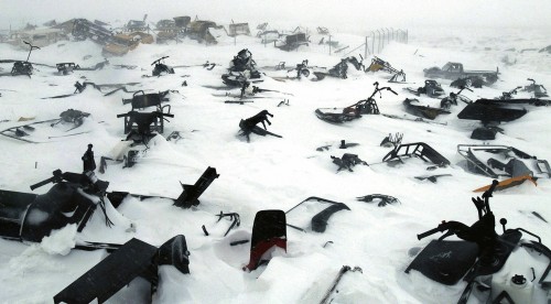 A skidoo graveyard in the remote arctic village of Ivujivik, Nunavik, Quebec, Canada, April 2006.